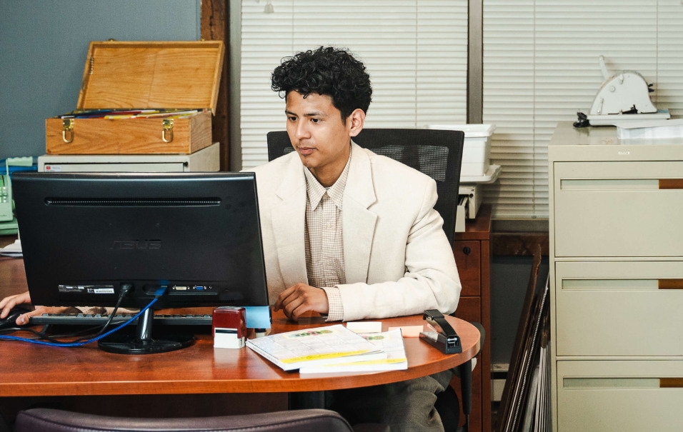 financial professional working behind a desk